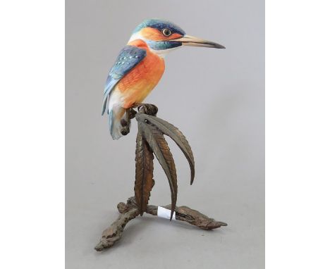 An Albany Fine China Co. ceramic bird study incorporating metal. Modelled as a Kingfisher. Factory mark to metal base. 15 cm 