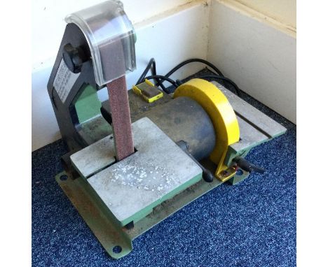 A belt together with a 5 inch disc sander.