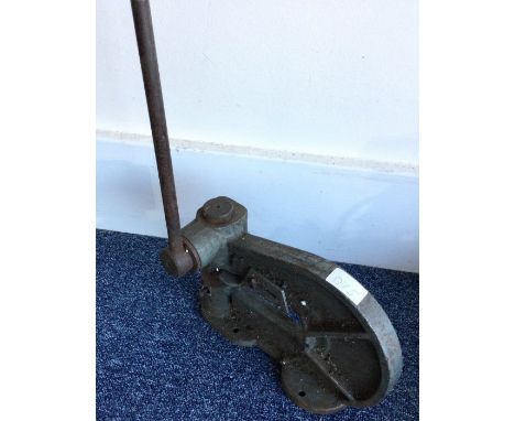 A metal punch tool.