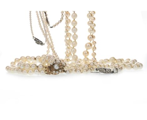 FOUR PEARL NECKLACES AND A PEARL BRACELET, each with gem set clasps, one necklace broken, and a three strand pearl bracelet w