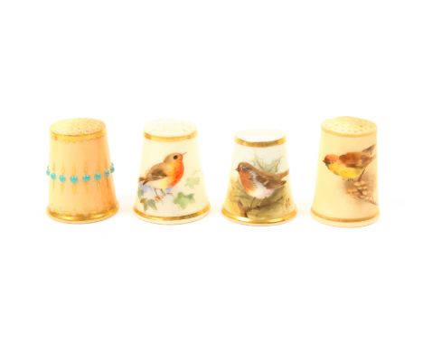 Four English porcelain thimbles, comprising a ‘jewelled’ Worcester example, black ground with band of turquoise within gilt b