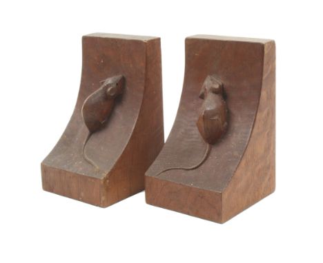 A pair of ‘Mouseman’ Thompson oak bookends each with swept mouse carved end, 15cm. (2)
