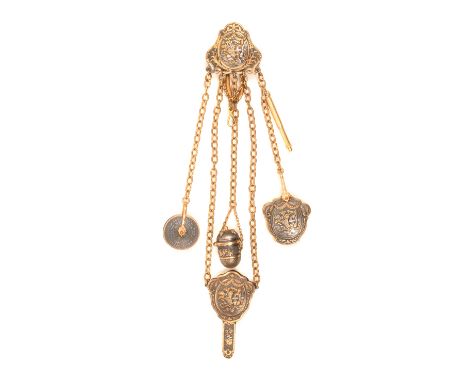 An impressive four colour metal chatelaine, late 19th Century in the 18th Century style, the shaped clip mount with a panel o