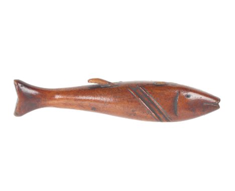 A mid 19th Century mahogany knitting stick in the form of a fish, with needle hole to mouth, 21cm.