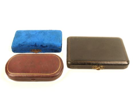 Three late 19th Century small format sewing companions comprising a blue plush rectangular example, a ribbed maroon leather e