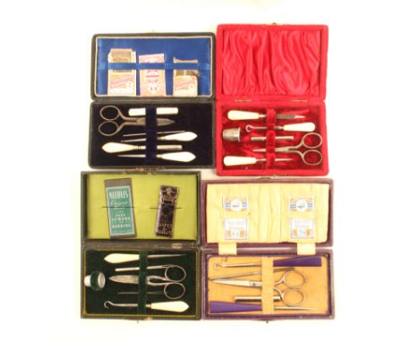Four late 19th Century small format sewing companions all of rectangular form, three in leatherette, one in plum coloured plu