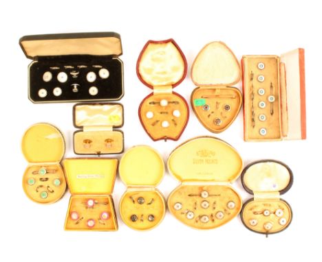 Ten cased sets of gentleman’s studs and related accessories including a 9ct. gold tie pin.  (10)