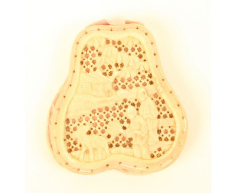 A mid 19th Century Chinese ivory pin cushion of pear shaped form pierced and carved with figures, trees etc., pink infill, 4.