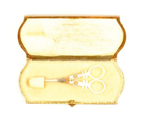 A pair of Palais Royal scissors and thimble in fitted leather case, the scissors with tapering steel blades, gilt mounts, the