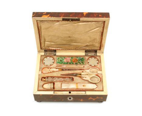 A French Palais Royal tortoiseshell small format sewing box of rectangular form, oval steel escutcheon, on steel ball feet, t