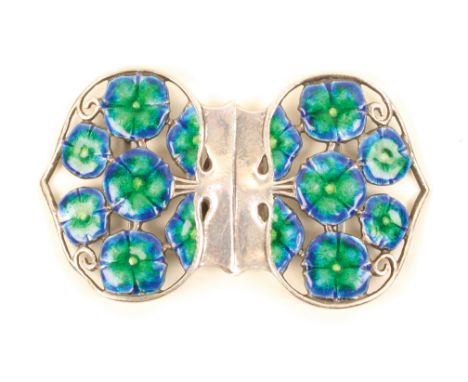 A lady’s silver and enamel waist buckle by Liberty & Co, each half of shaped outline with five full and two part flower heads