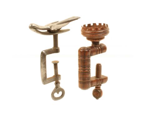 Two sewing clamps comprising a rosewood turned frame example with crenellated top to take a pin cushion, 10.5cm, and a steel 