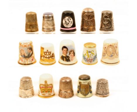 Fifteen British Royal commemorative thimbles comprising seven silver examples, EIIR on ribbed band, EIIR coronation coach, an