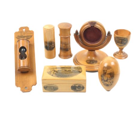 Mauchline ware – seven pieces, comprising a circular watch stand (Shanklin From The Cliff), 14cm, a waisted cylinder box (The