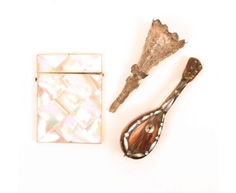 A mixed lot comprising a silver posy holder of leaf form over a filigree base, sd to base, 12.5cm., a tortoiseshell model man