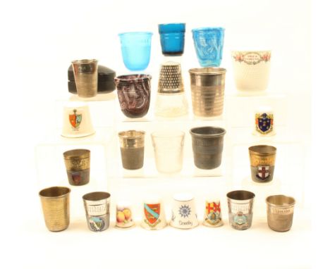 A collection of ‘Just A Thimble Full’ measures and large decorative thimbles, comprising ten metal, one in leather case, six 