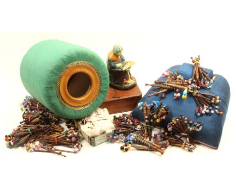 A large selection of 19th Century wooden lace bobbins a few inlaid, pewter and wire decorated together with lace pins and a f