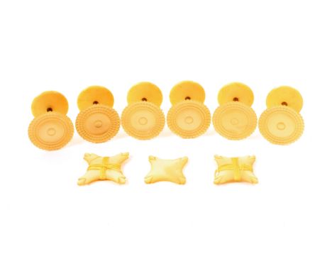 A set of six mother of pearl top reel holders and three mother of pearl silk winders, the reels with engine turned tops over 