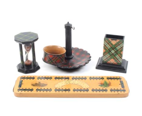 Tartan ware – 5 pieces – comprising a petal base watch stand (untitled), an egg timer (untitled), a napkin ring (untitled), a