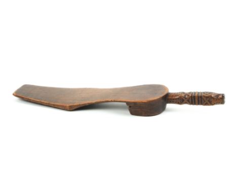 An attractive 19th Century stained beech knitting stick in the form of the sole of a shoe, the square section stem with chip 