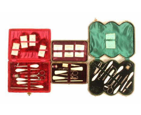 Three late 19th Century small format sewing companions comprising a triple section black leather example, with fancy mother o