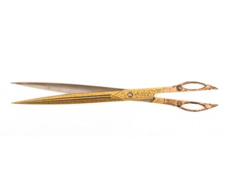 A pair of 19th Century Persian calligraphy scissors, sprung hinged loops, the arms and blades with gilt damascened floral dec