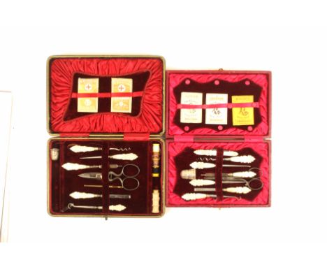 Two late 19th Century small format sewing companions comprising a rectangular black leather example with fancy mother of pear