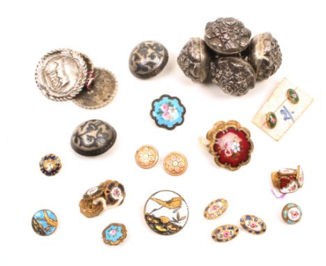 Buttons – a small collection of buttons comprising three 19th Century silver examples, two after the antique and one depictin