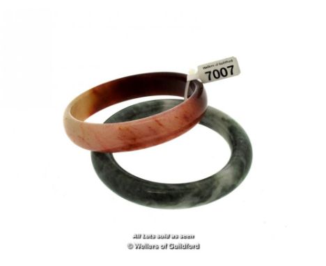Jade fixed bangle and a quartz fixed bangle 