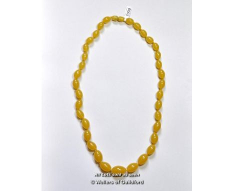 Vintage amber necklace, oval gratuated beads, length 71cm, weight 68 grams 