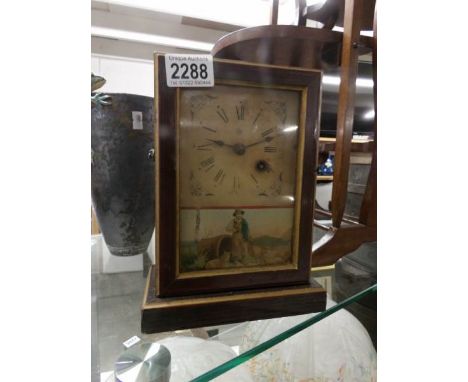 A 19th century mantel clock.