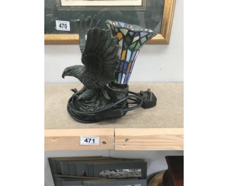 A Tiffany style table lamp featuring eagle figure A/F