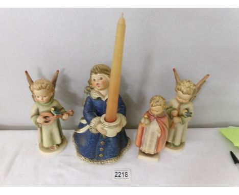 3 Goebel angels and a Goebel choir boy.