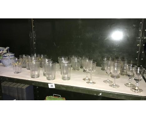 A quantity of vintage drinking glasses