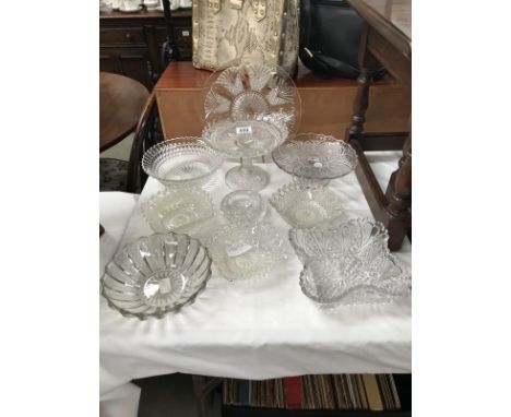 A quantity of vintage moulded glass dishes, cake stands etc.