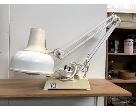 An angle poise lamp