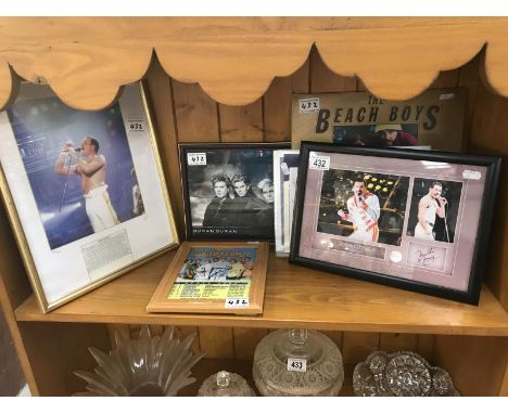 A collection of autographs - Duran Duran, Robbie Williams, Jonny Wilkinson, The Beach Boys (with record), Freddie Mercury (wi