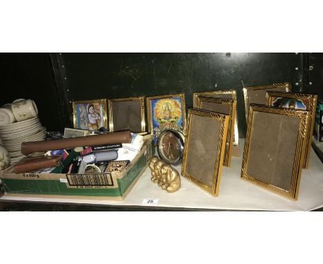 A quantity of gilded photo frames, vintage playing cards, 1970's Yorkshire slides etc.