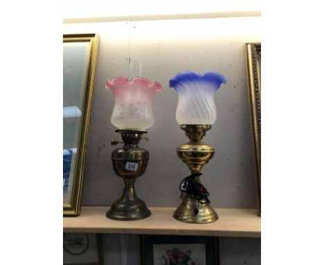 An electric and an oil lamp