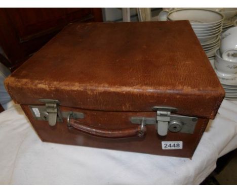 A vintage gentleman's travel vanity case with fittings.
