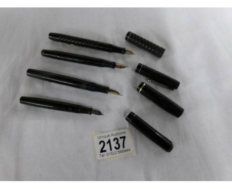 2 Swan 'Mabie Todd' fountain pins with 14ct gold nibs and 2 other vintage fountain pens also with 14ct gold nibs.