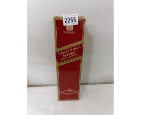 A boxed bottle of Johnny Walker Red Label old scotch whisky.