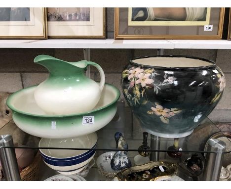 A large floral painted planter and a large jug and basin