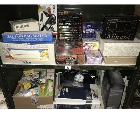 A quantity of mostly new boxed items including infrared lamp, tens machine, electric razor, glasses, Corby tie press etc. (2 