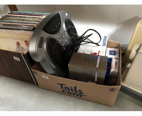 A mixed lot of electrical goods including blood pressure monitor, infrared lamp etc.
