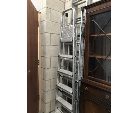 2 step ladders and an extending ladder