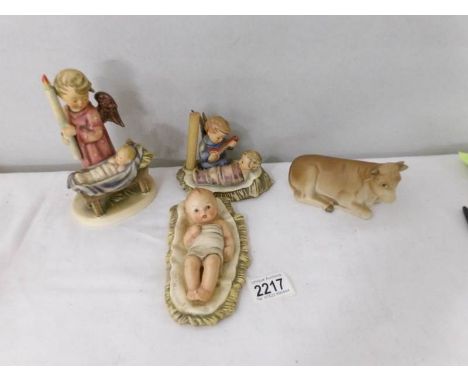 3 Goebel nativity figures and a Goebel cow.
