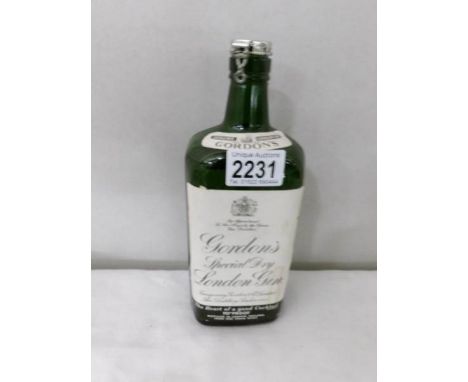 A vintage bottle of Gordon's Special dry London gin.