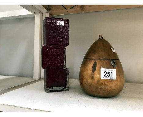 A replica tea caddy in the shape of a pear and a replica brick layer vase