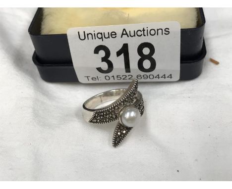 A silver ring stamped 925